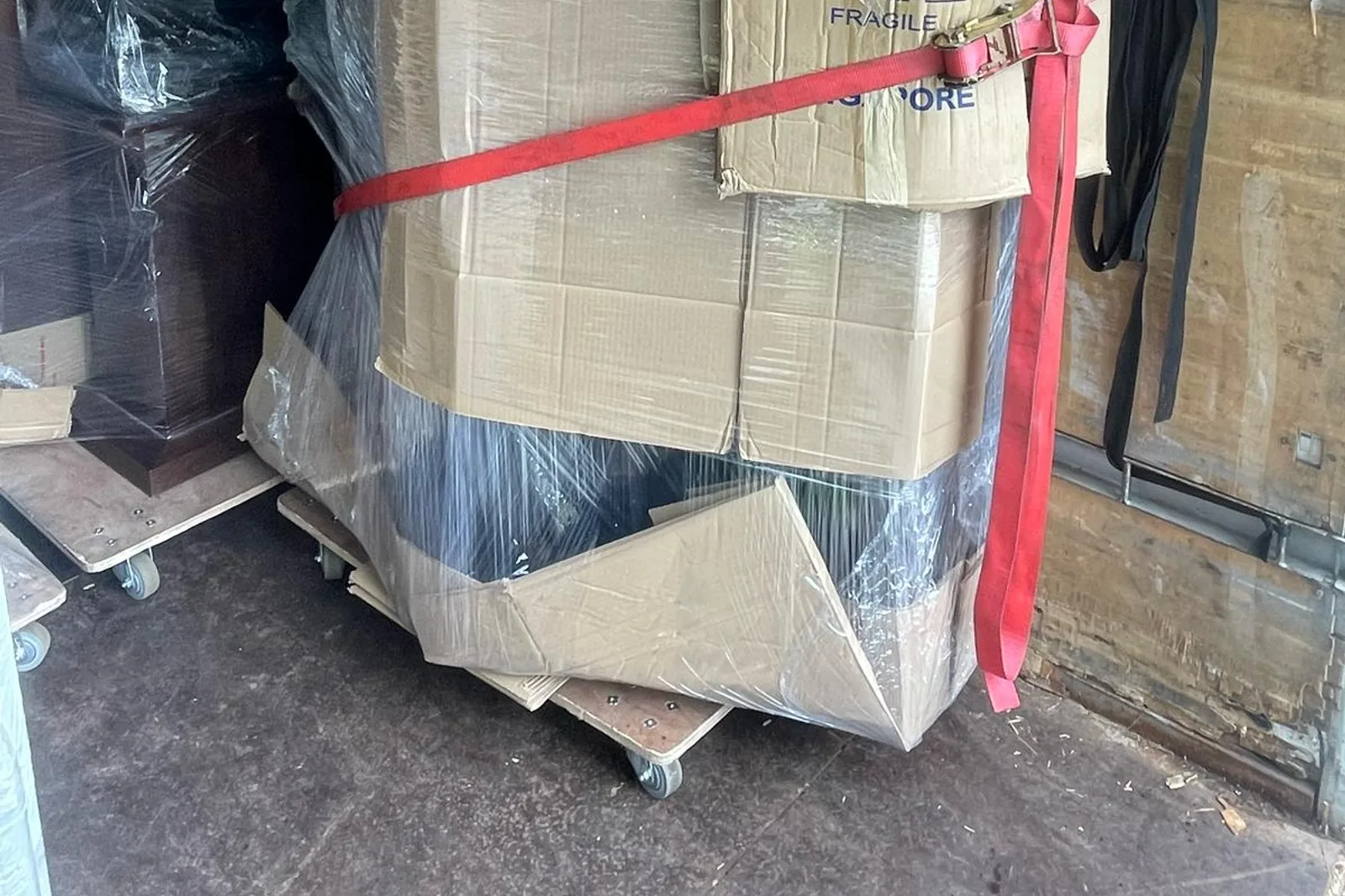 Commercial equipment protected and secured inside a moving truck