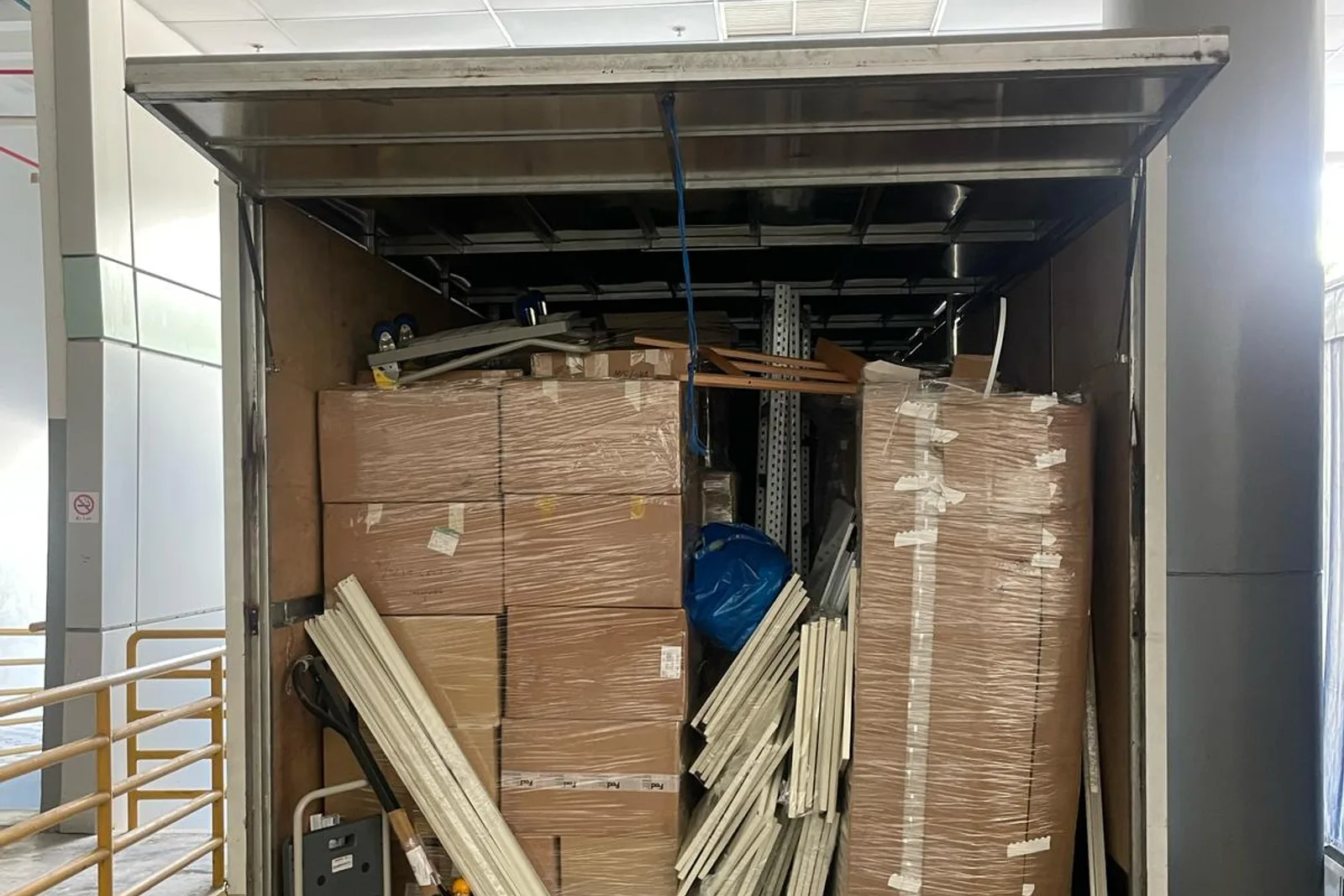 Moving truck loaded for a commercial equipment relocation