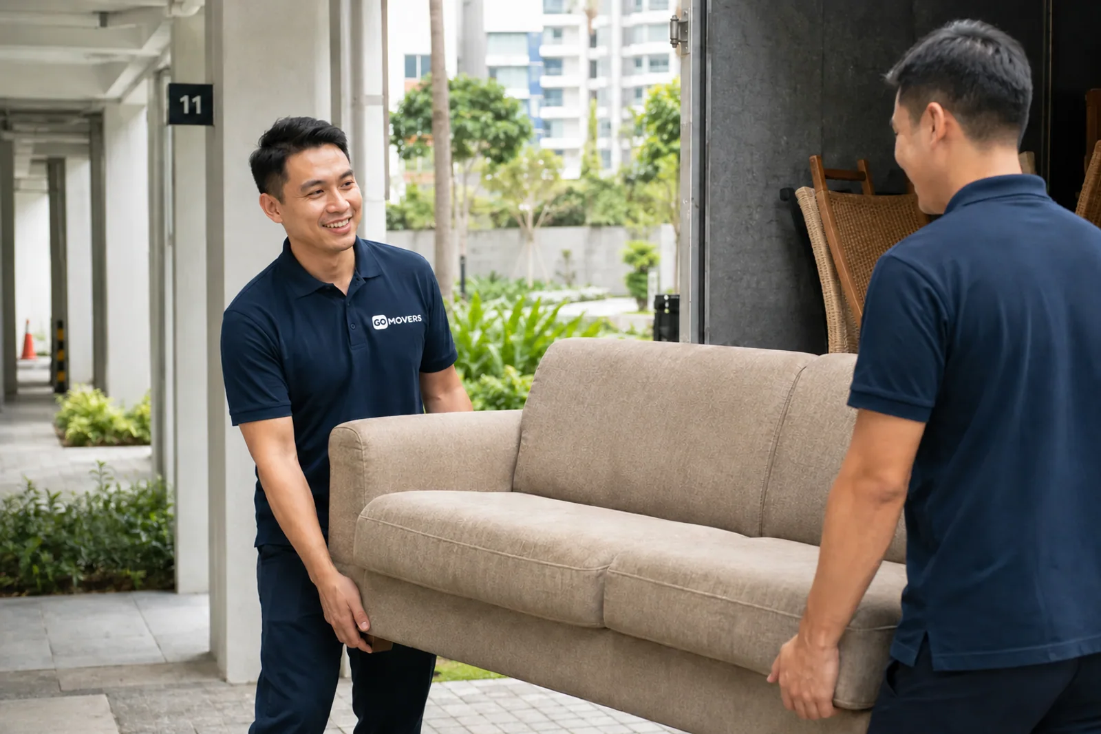 Illustration of a moving team carrying furniture at a Singapore residential property